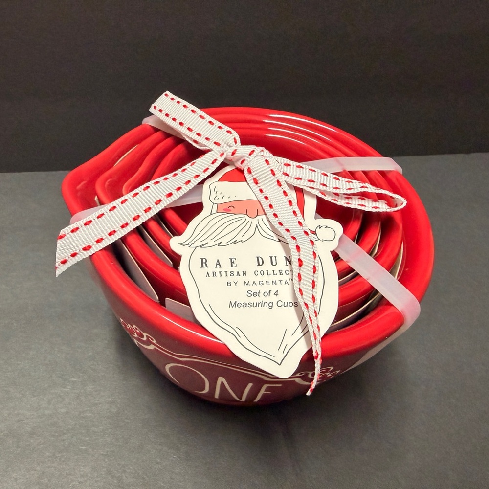 NEW WITH TAG RAE DUNN RED CHRISTMAS MEASURING CUPS.  NEW THIS YEAR!!